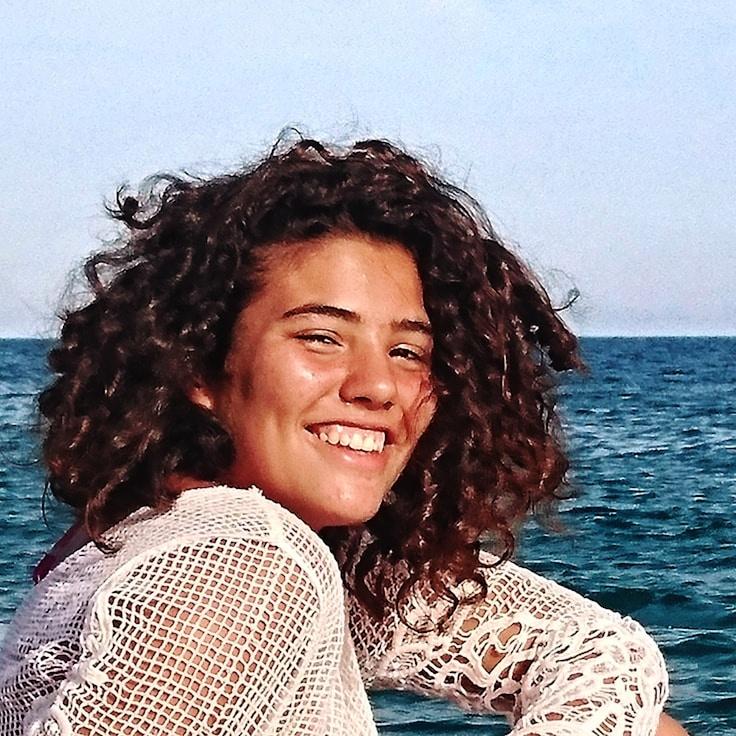 Anika Sharma, Client Relations Director, discussing corporate gifting strategy with business clients