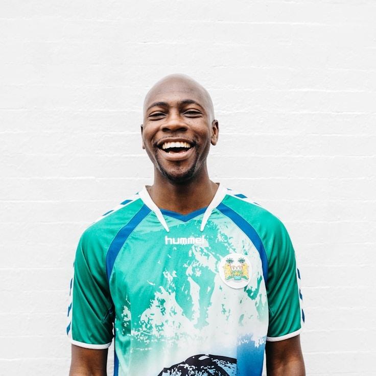 Aanya Kapoor, Lead Design Curator at Modest Cloud Anchor, reviewing corporate floral arrangements